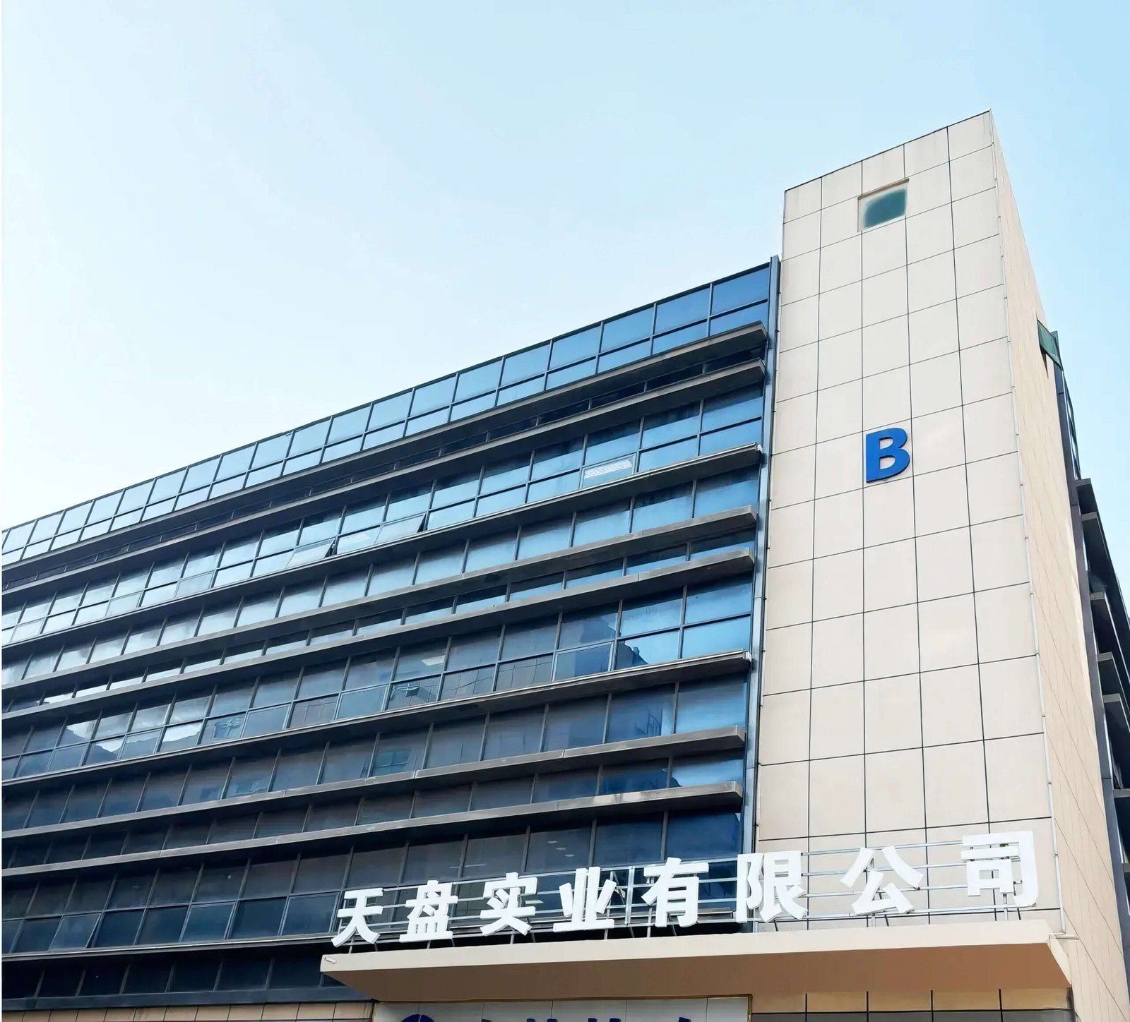 Tipacharge power bank manufacturing facility - Factory building entrance in Shenzhen